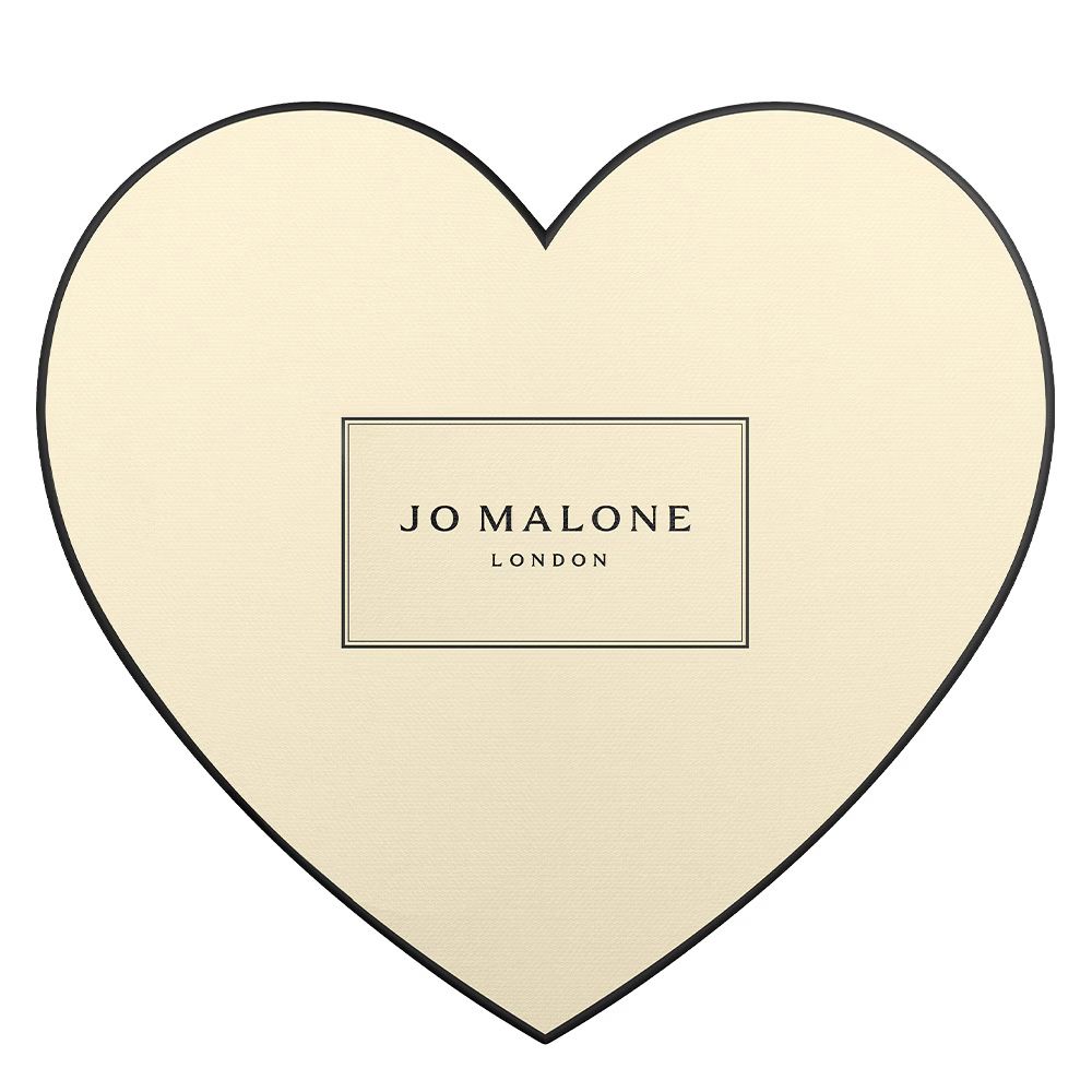 Jo Malone London cream-colored heart-shaped gift boxes arranged in a row against a light background.