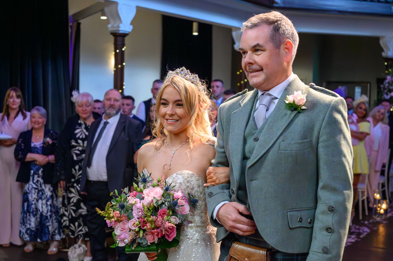 Daughter walks beautiful Amy down the aisle and St Jude's in Glasgow to meet her husband to be.