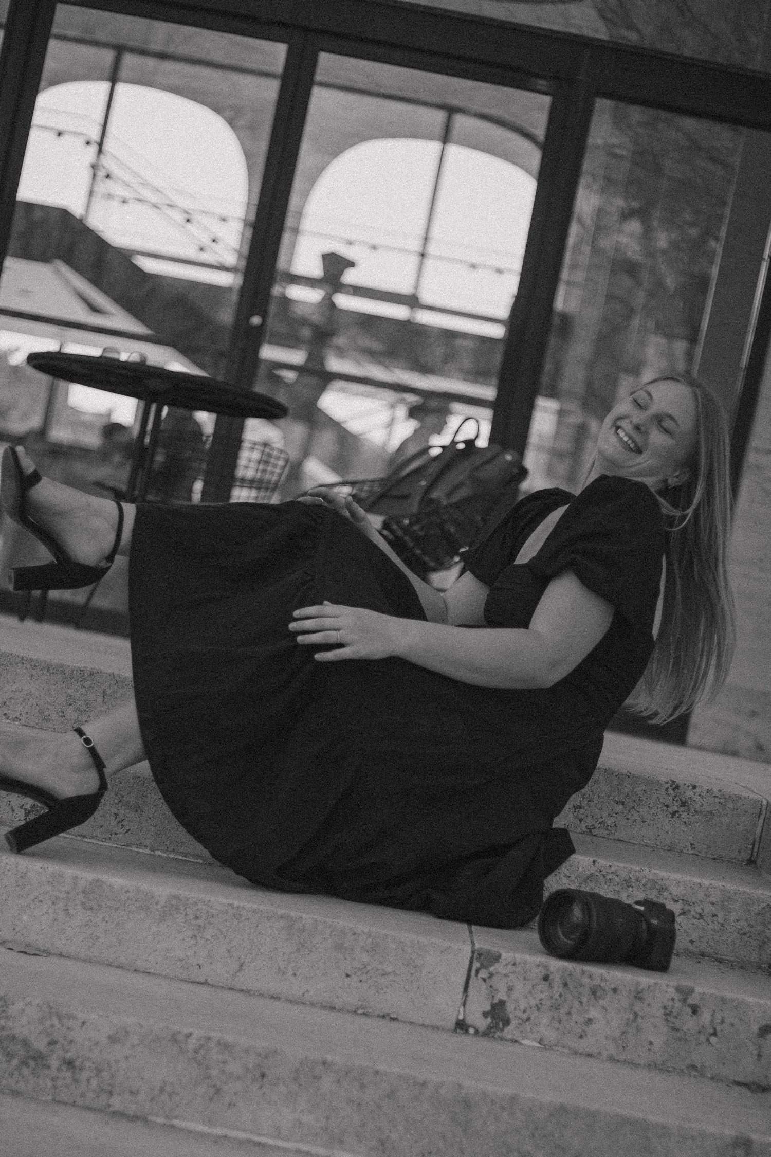 Black and white photo series showing movement and dance poses near a wall.