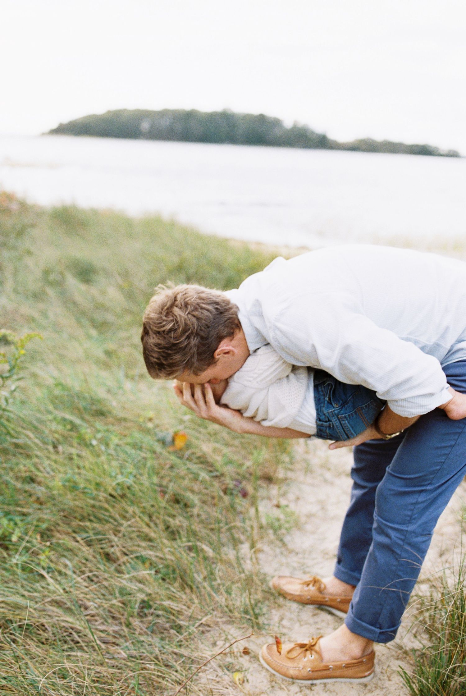 Exploring the coastal grasses and beach landscape at golden hour.