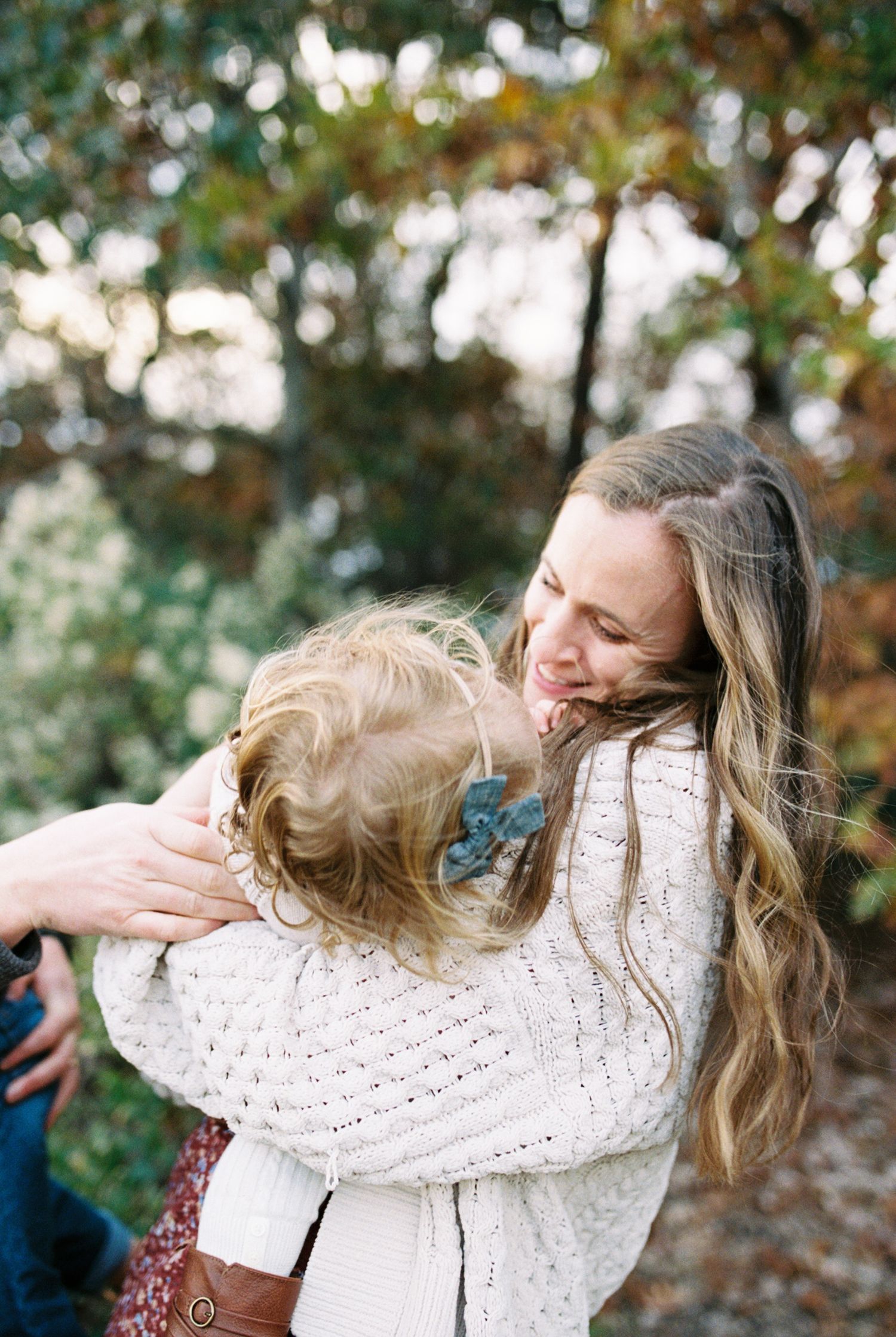 Candid autumn moment showing movement and connection outdoors.
