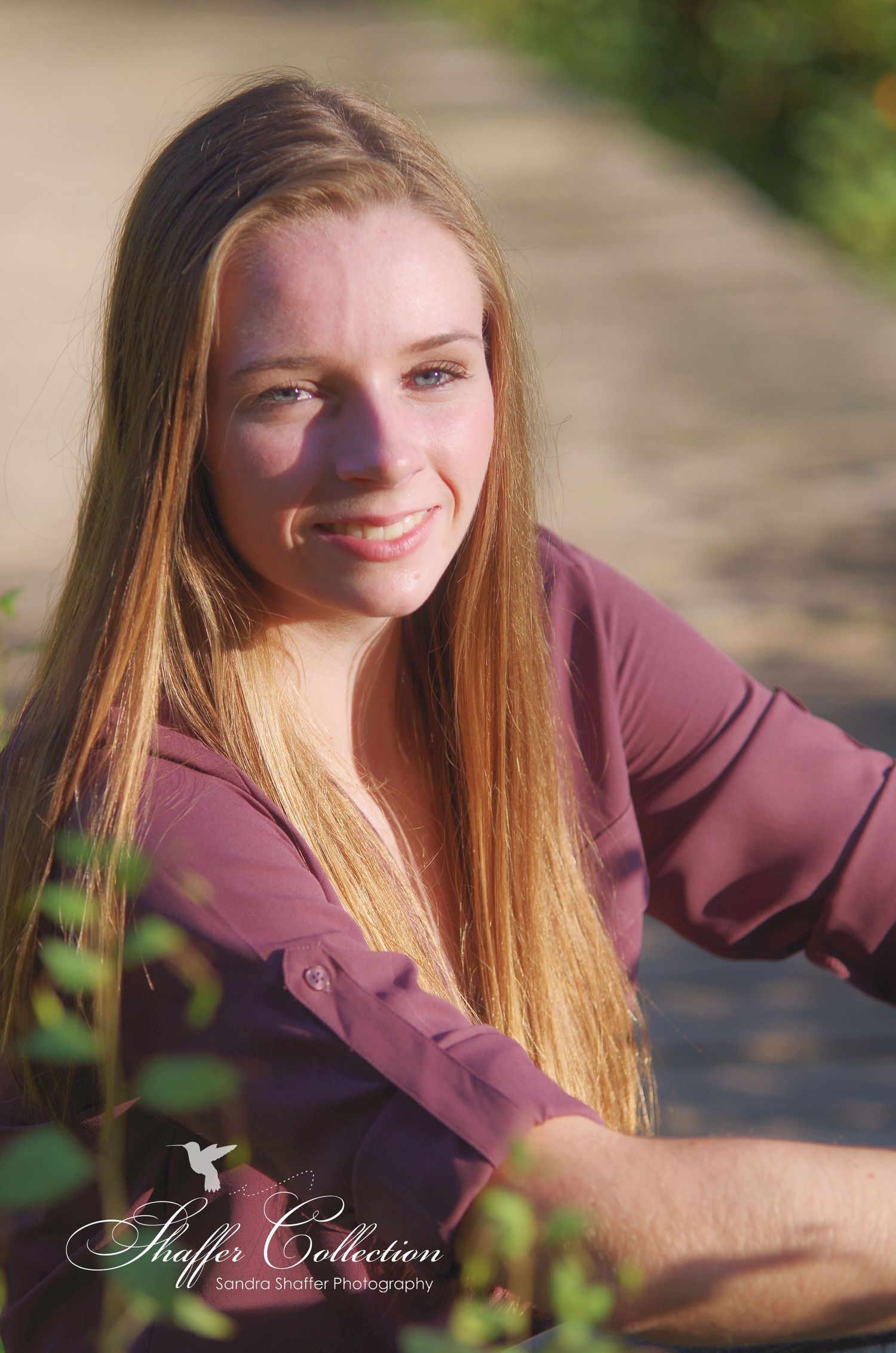 Artistic portrait series with soft lighting and burgundy tones.