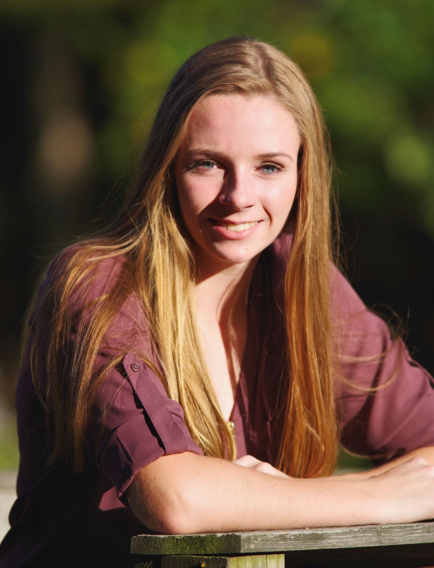 Natural light portrait with warm golden lighting.