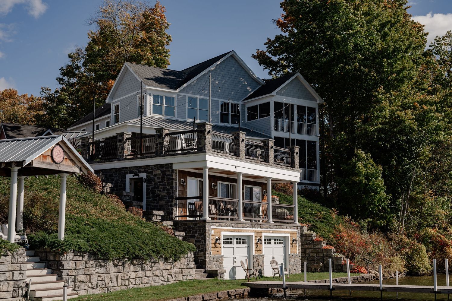 Documentary style photo of a lake house wedding venue over looking mountains and lake in the Berkshires Massachusetts