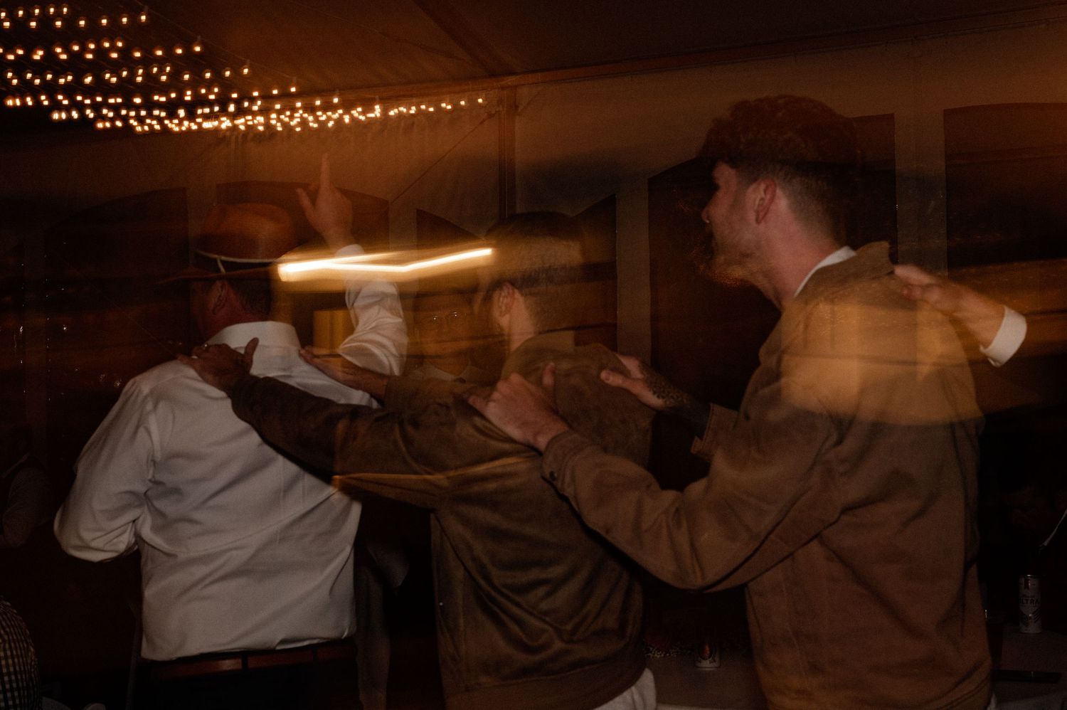 Documentary style candid of guest dancing at energetic wedding reception in the Berkshires Massachusetts
