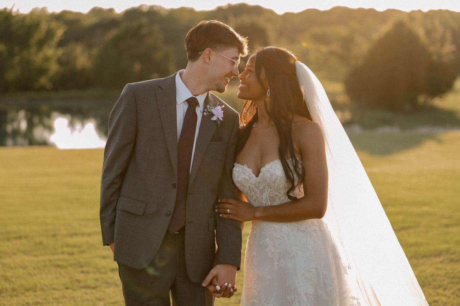 Romantic candid photo of bride and groom during couple portraits at wedding in Princeton, Texas
