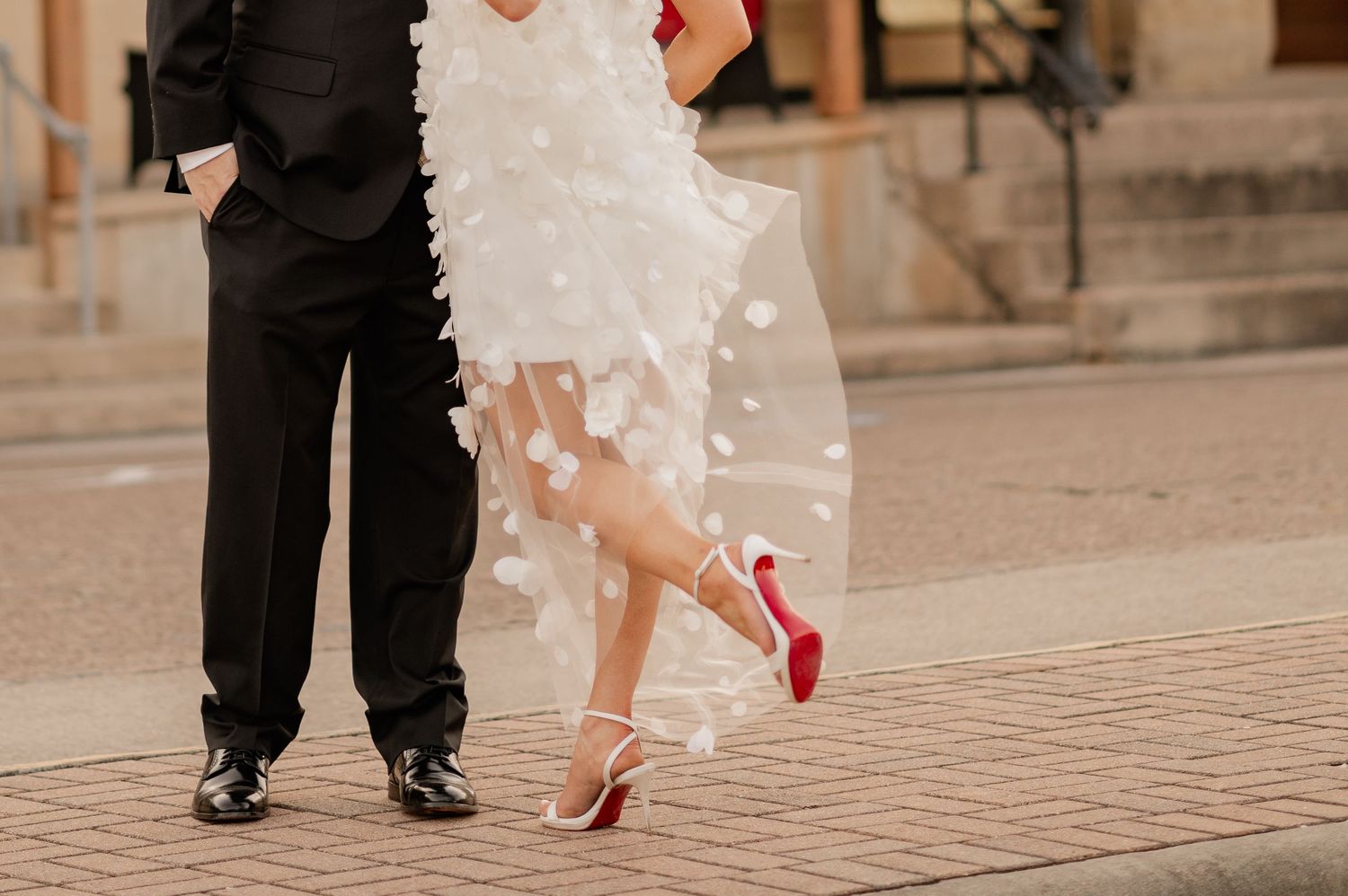 Close up detail photo of a bride and groom during wedding portraits in downtown Hallettsville, a south Texas town.