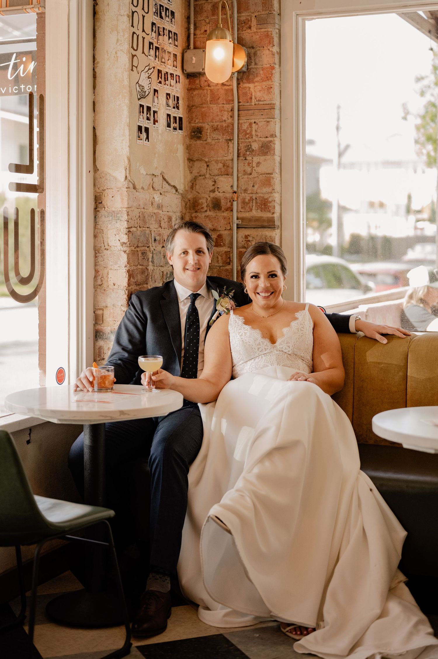 Wedding couple enjoying beverages in a quaint Bishop Arts bar in Dallas, TX