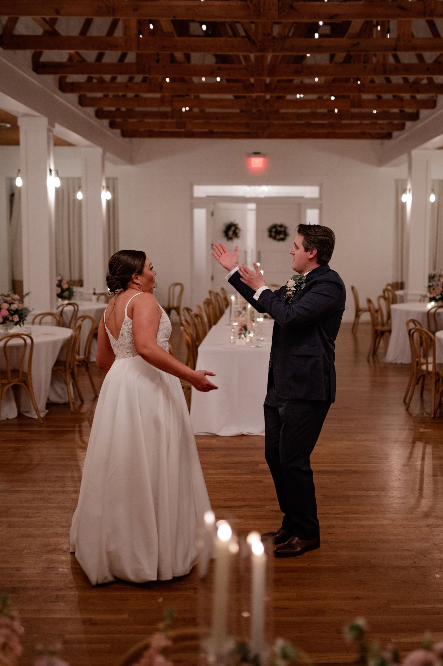 Wedding couple playfully dancing at private last dance in Bishop Arts venue in Dallas, Texas
