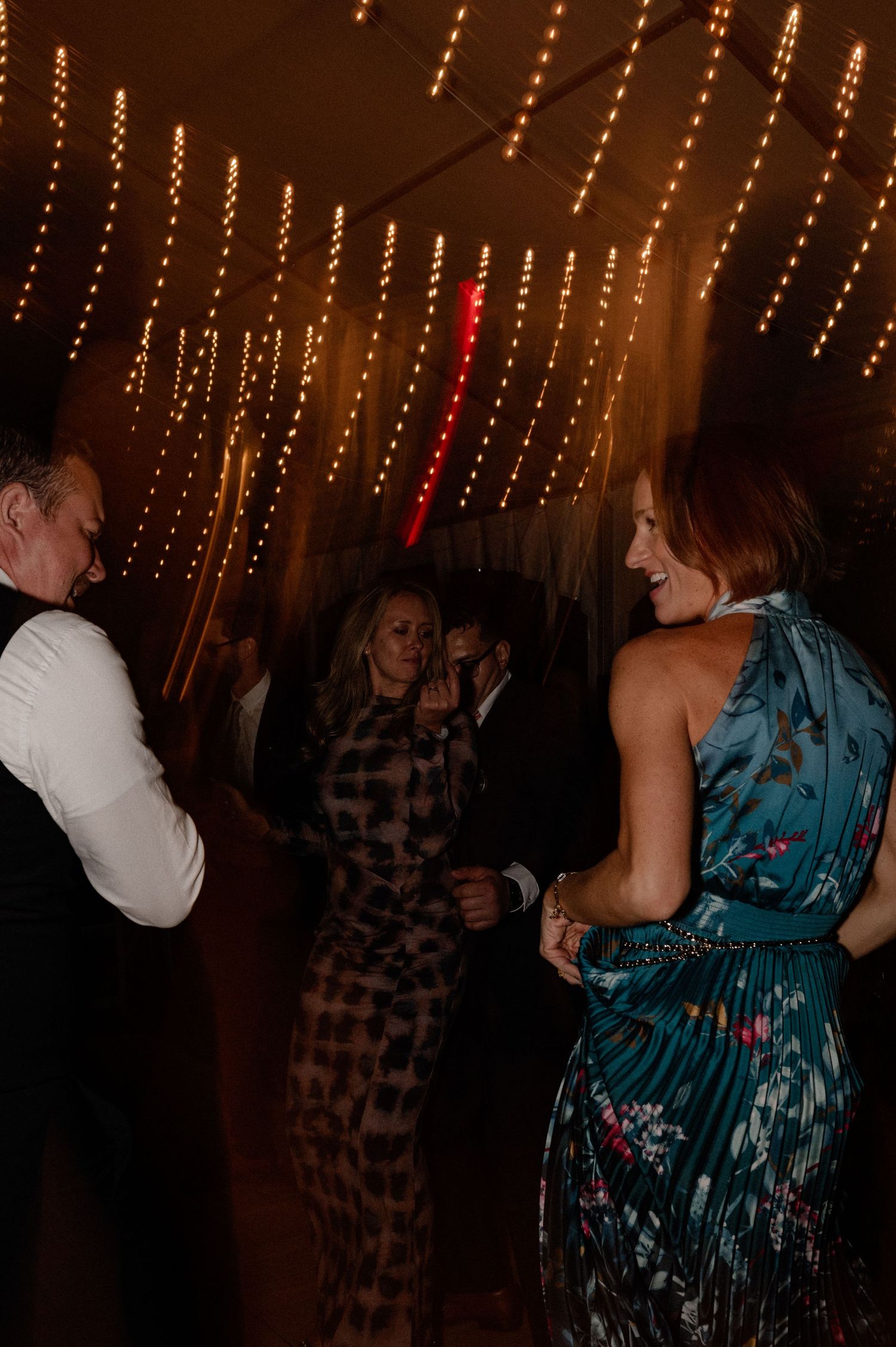 Documentary style candid of guest dancing at energetic wedding reception in the Berkshires Massachusetts