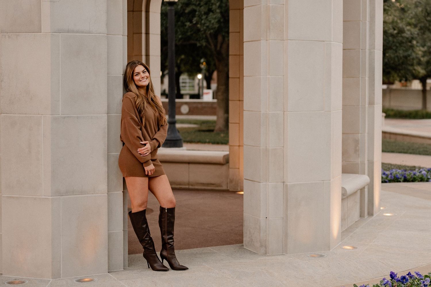 Senior girl casually posing at Southern Methodist University for a fall senior photo session