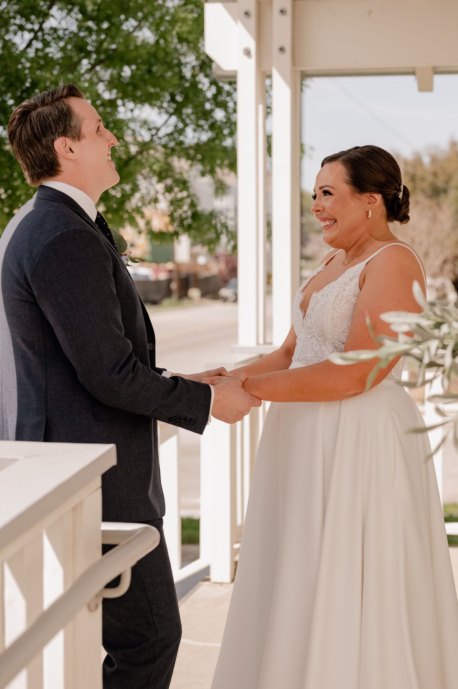 Emotional wedding first between bride and groom outdoors for their Spring wedding