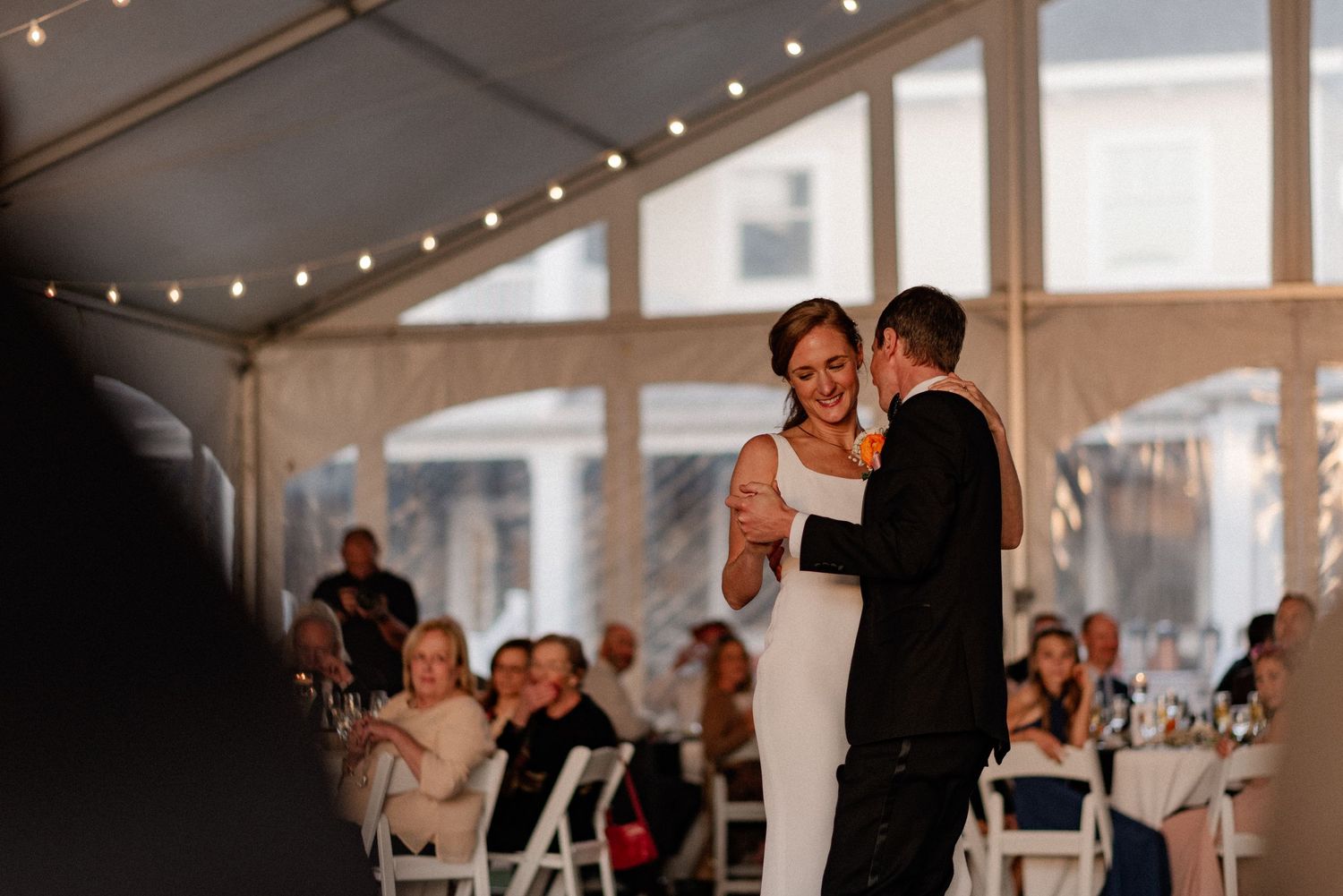 Documentary style candid of bride and groom's first dance at wedding reception in the Berkshires Massachusetts