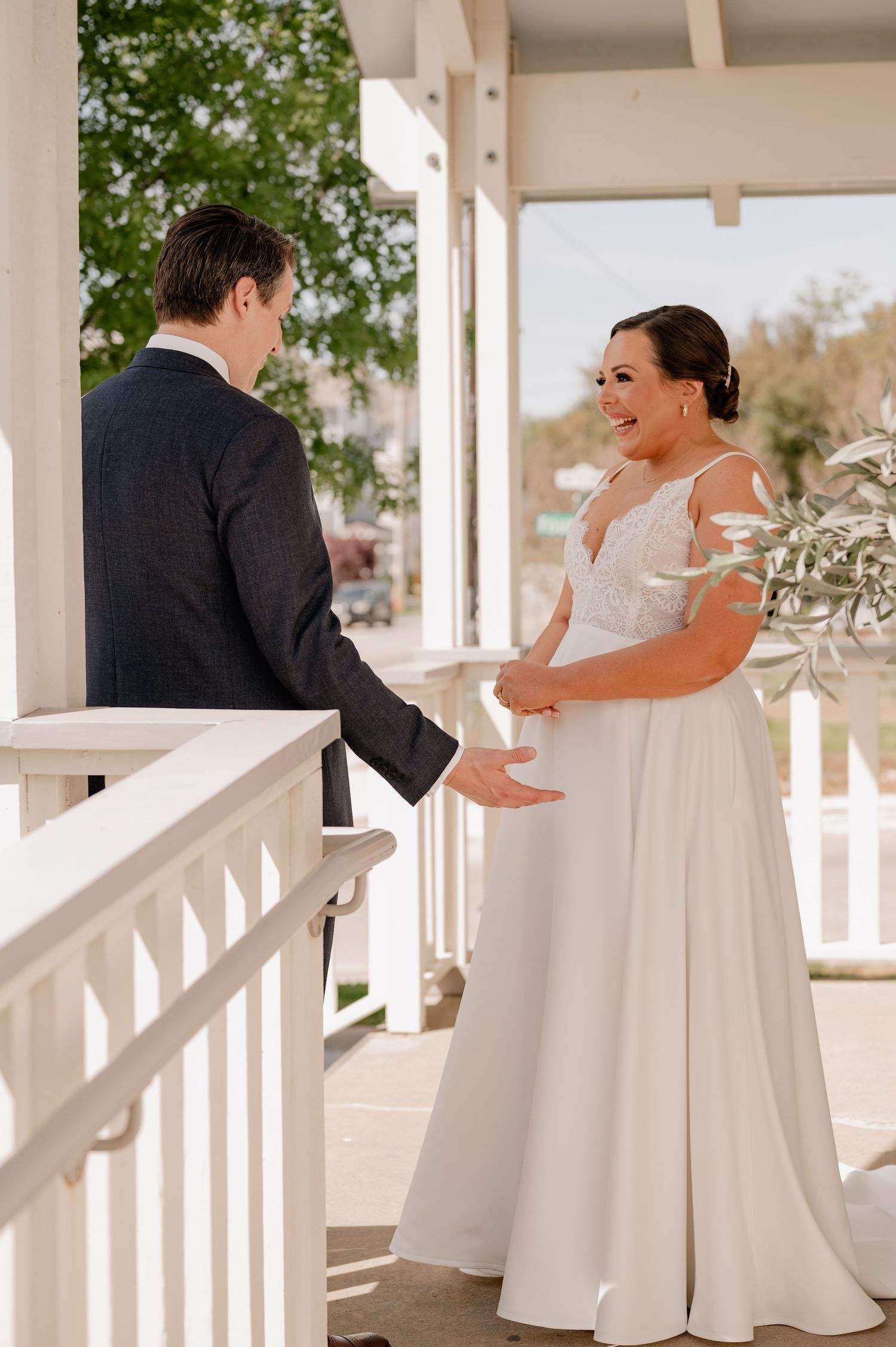 Emotional wedding first between bride and groom outdoors for their Spring wedding