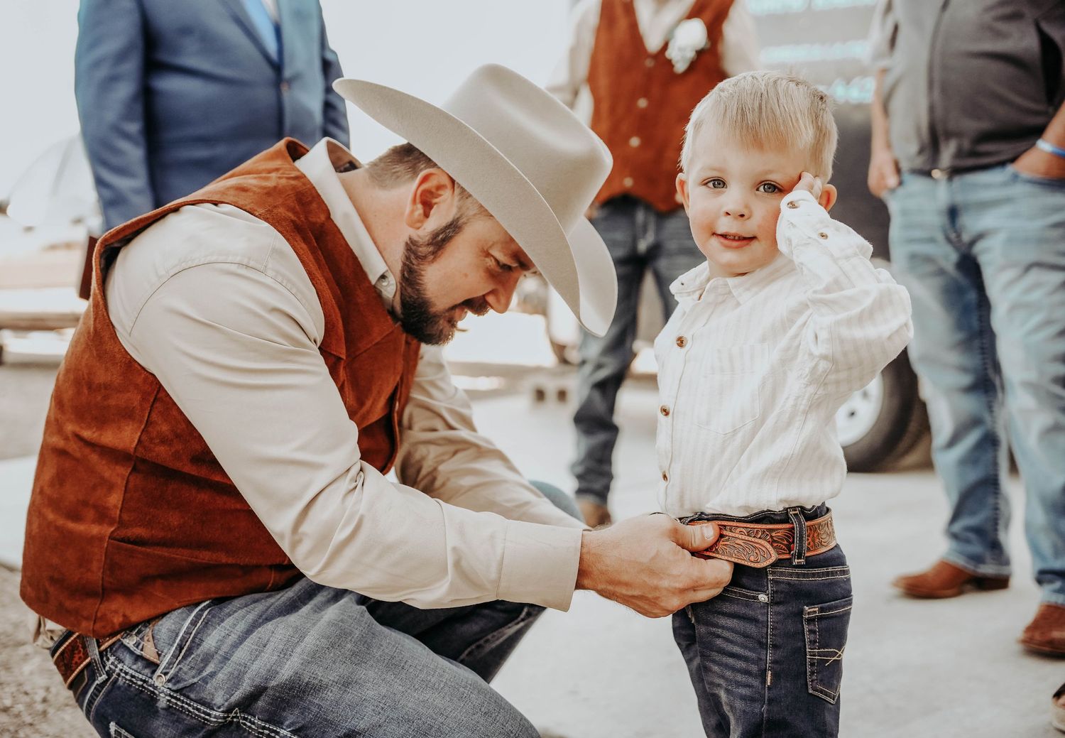 Casual outdoor engagement or wedding moments captured in candid style.