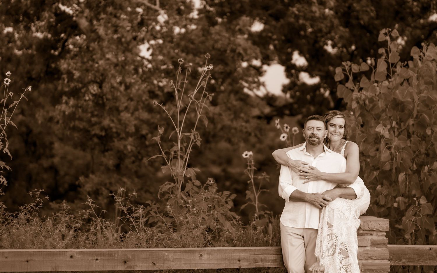 A series of outdoor photos showing couples in a rustic forest setting posing for romantic engagement portraits.