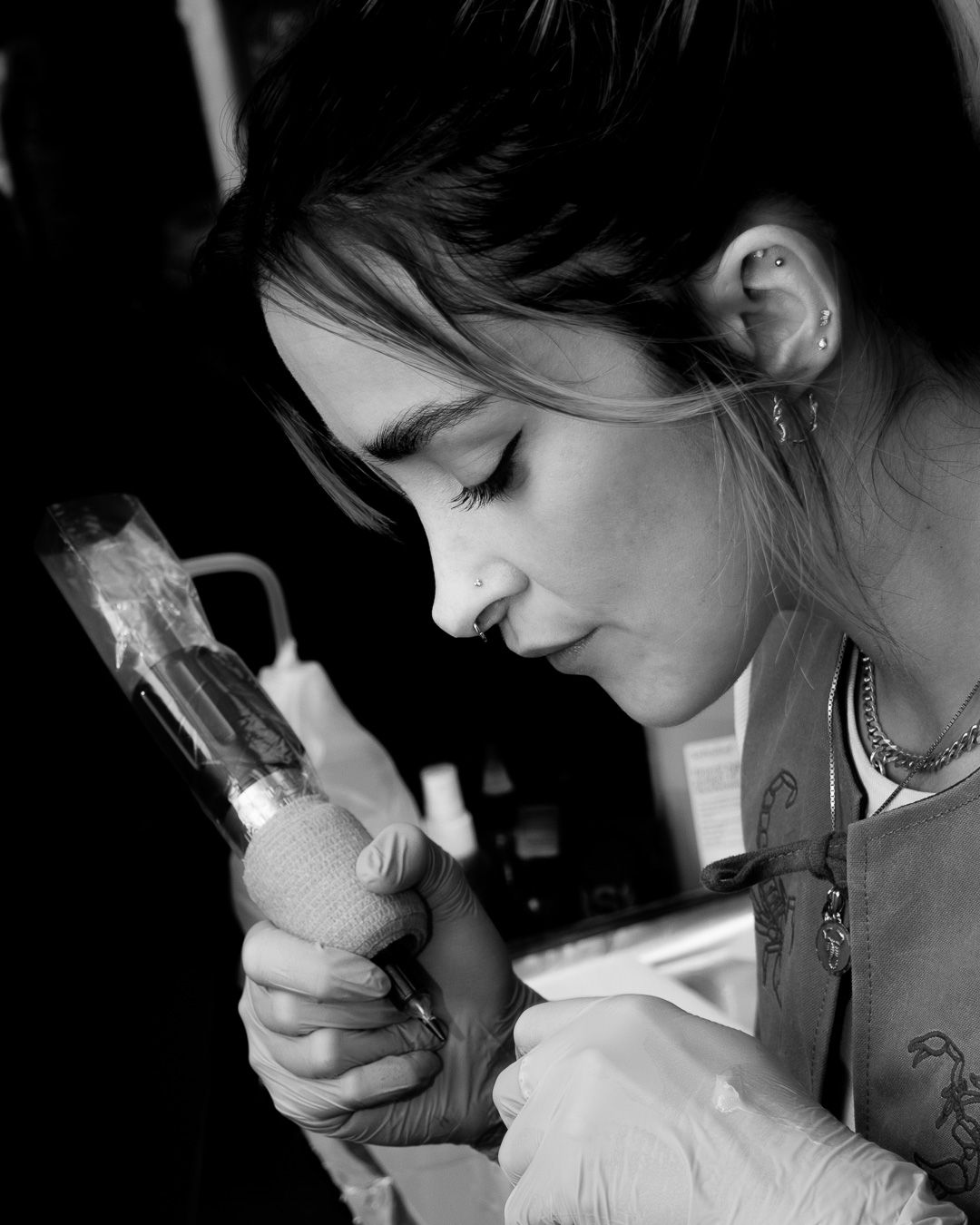 Black and white artistic photo series showing a person in profile view looking down in contemplative poses.