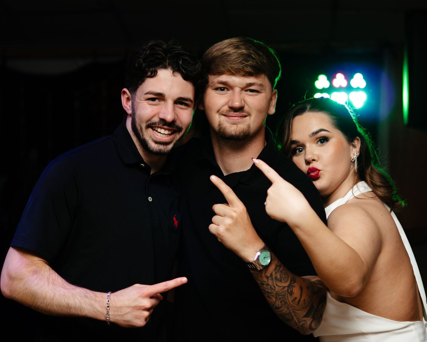 A sequence of candid party photos showing people posing and smiling together at a nightclub with green lighting.