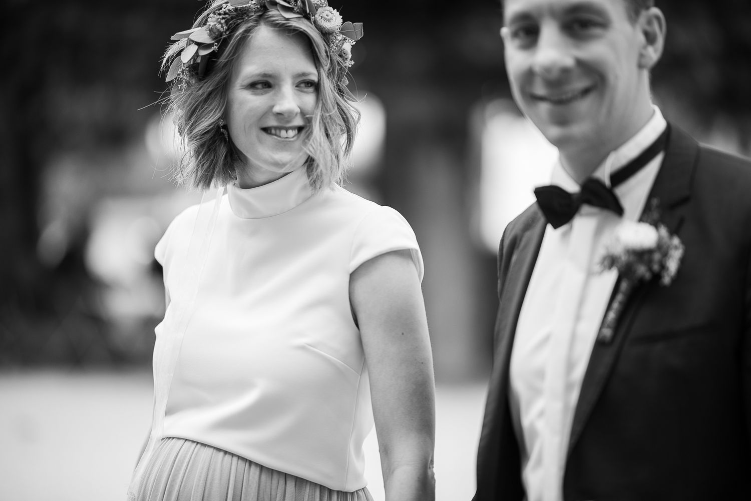 Black and white wedding photos show happy couples sharing intimate moments during their celebration.