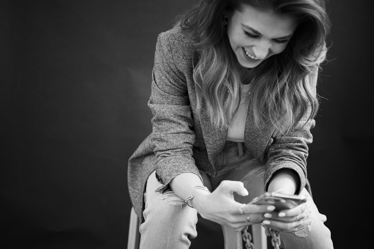 Candid black and white portraits showing joyful expressions.