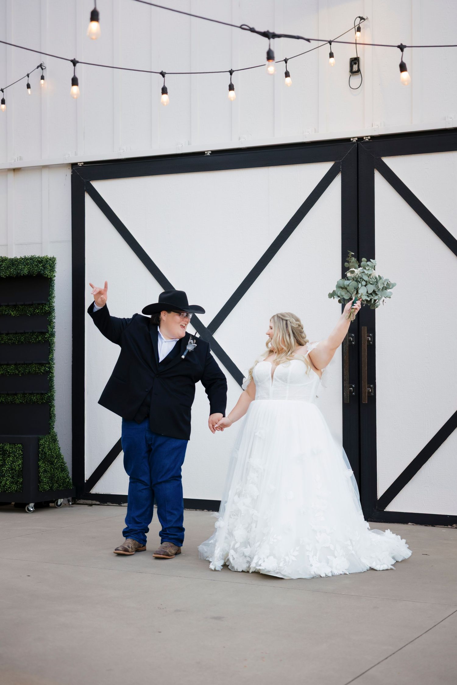 Western wedding photos with cowboy and his wife
