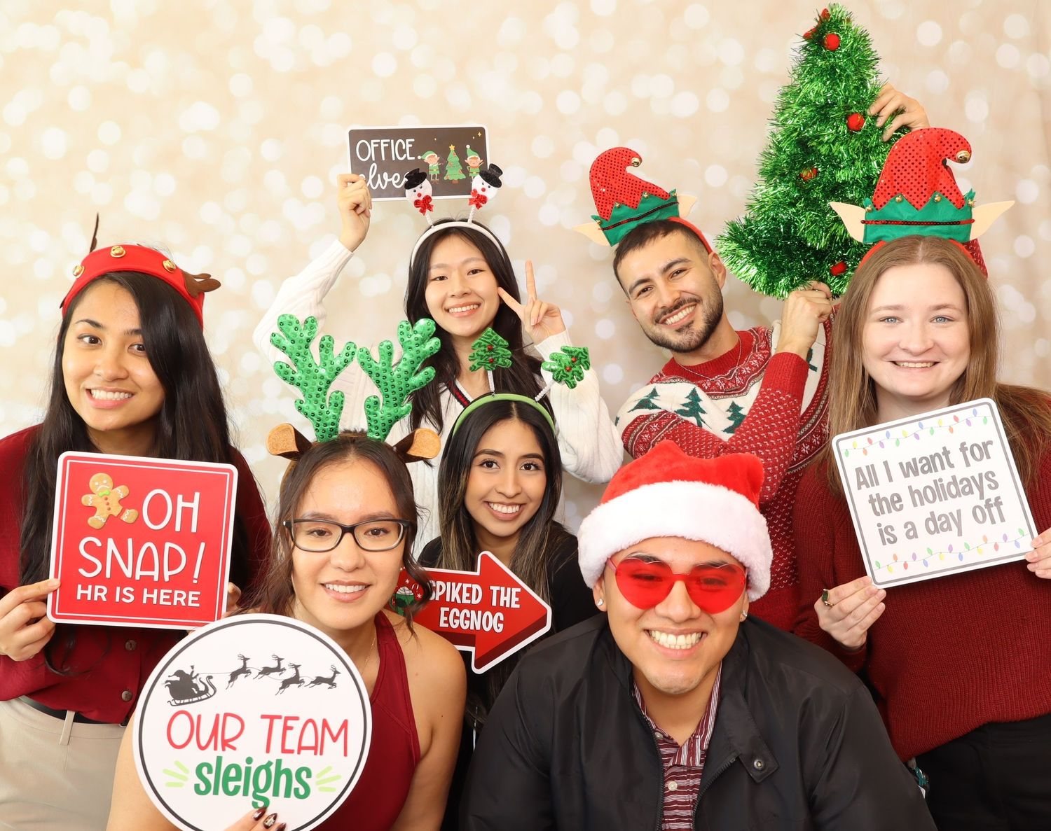 A festive collage of people wearing holiday accessories and holding Christmas photo props at a party celebration.