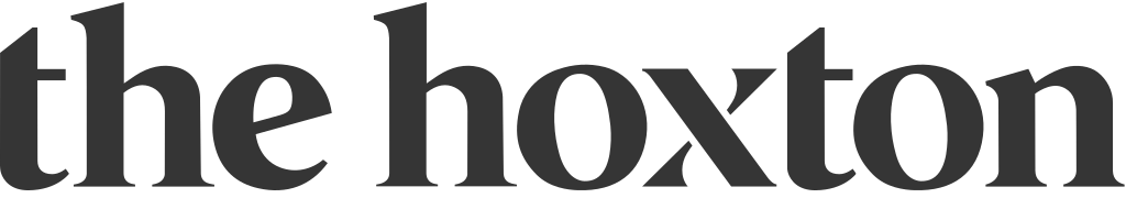 A black and white text logo design for The Hoxton displayed on a light background.