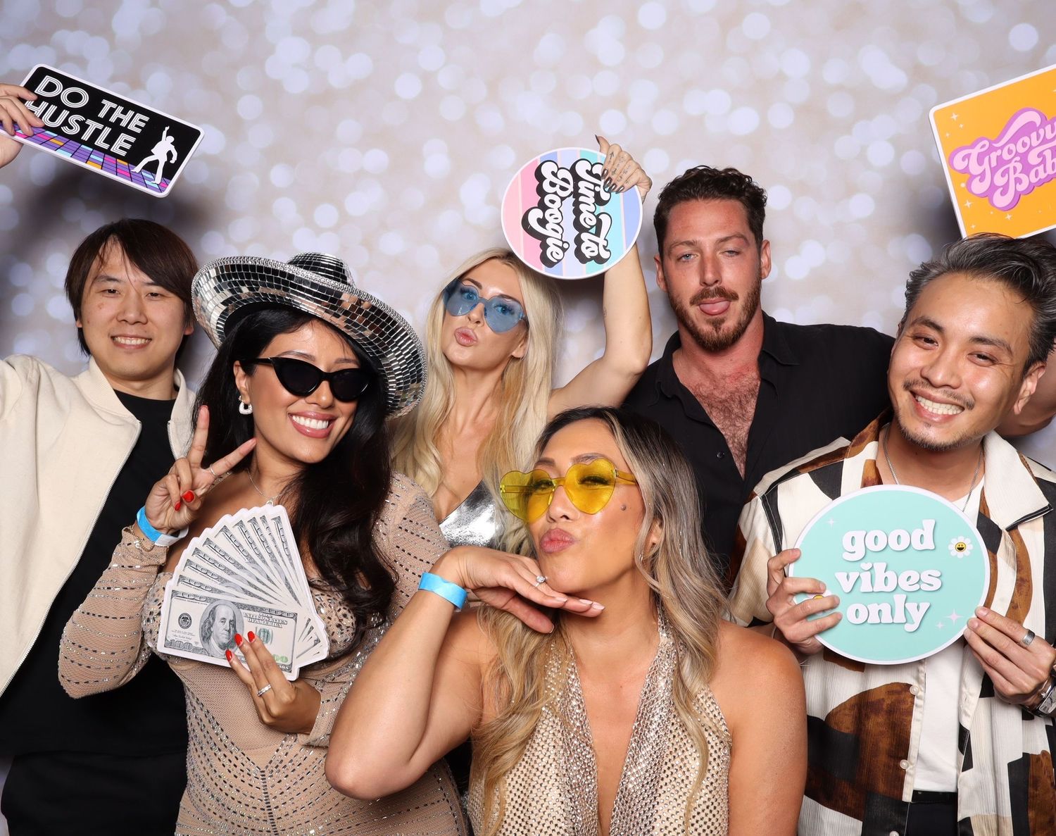A series of photo booth style party pictures showing people having fun with props and making silly poses.