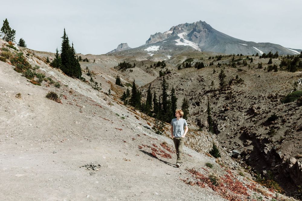 High school senior hiking alone on a mountain trail near Mt. Hood Oregon