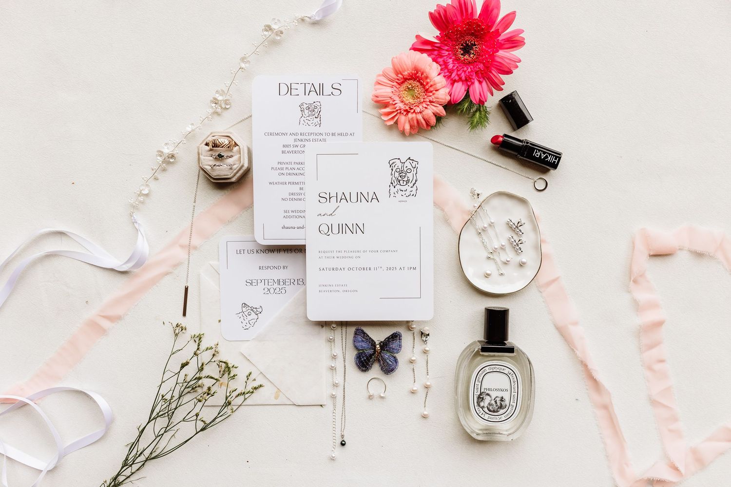 Modern minimalist wedding invitation suite for Shalina and Quinn styled with flowers and perfume.