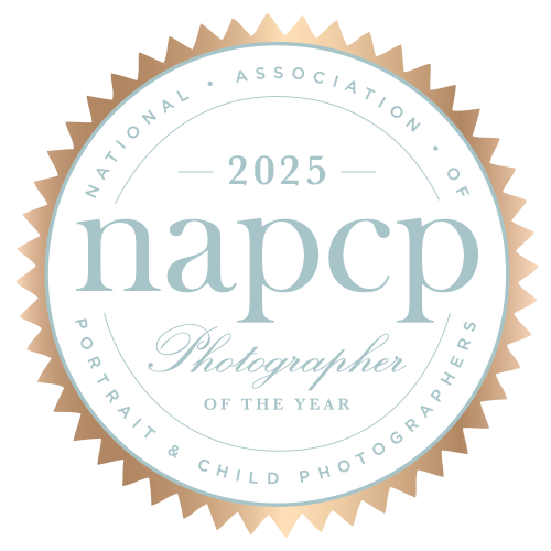 2025 NAPCP Photographer of the Year badge for National Association of Portrait and Child Photographers.