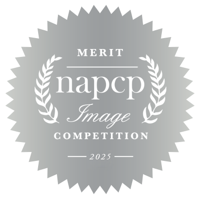 Silver merit badge for NAPCP Image Competition 2025 with laurel wreath design.
