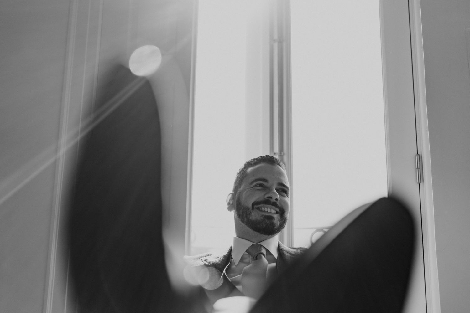 Groom portrait during relaxed wedding preparations in Porto