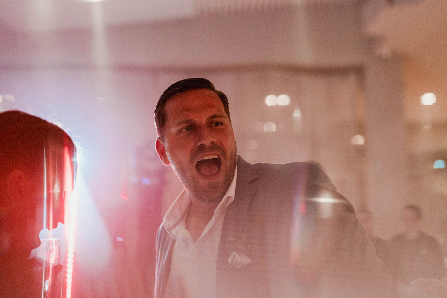 Celebration at Set Lounge, Portugal. Guests dancing and enjoying the high-energy vibes of the German-style wedding.