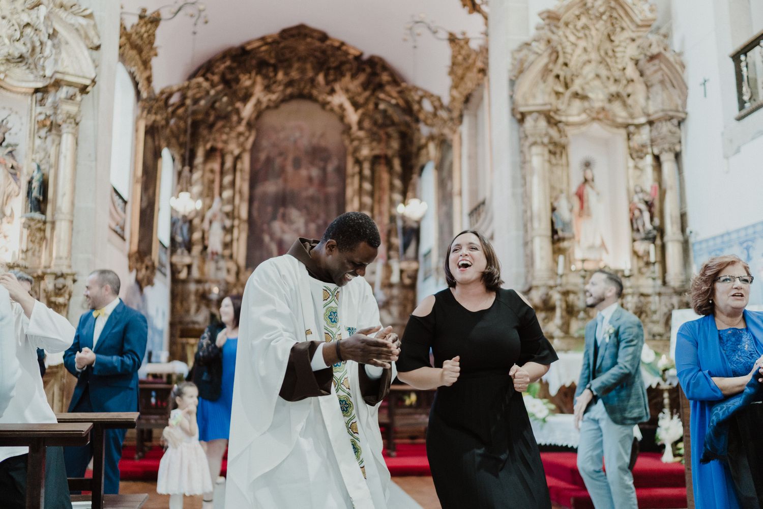 Wedding guests dancing together during an intimate celebration in Porto