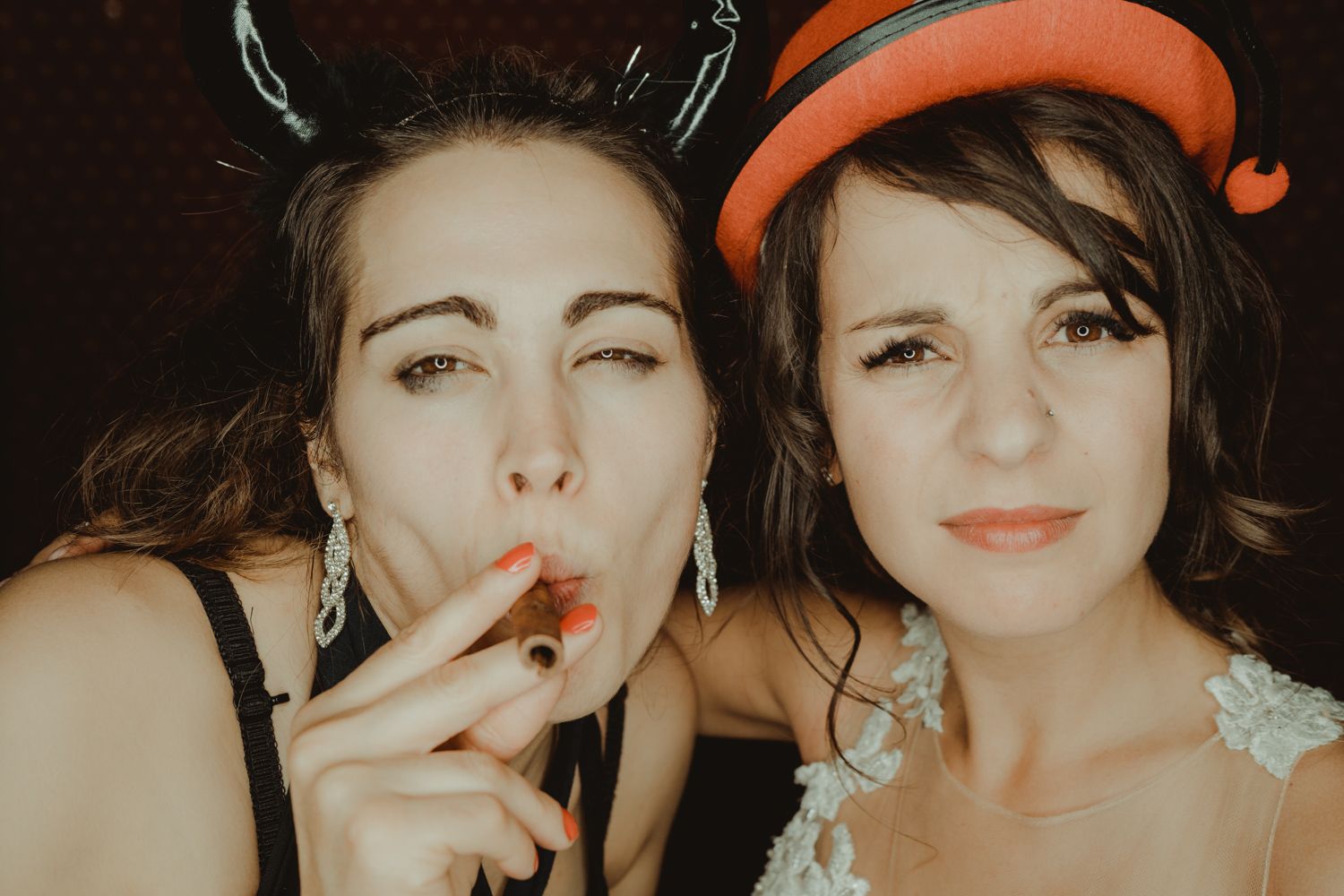Candid photo booth moment captured by Portugal wedding photographer