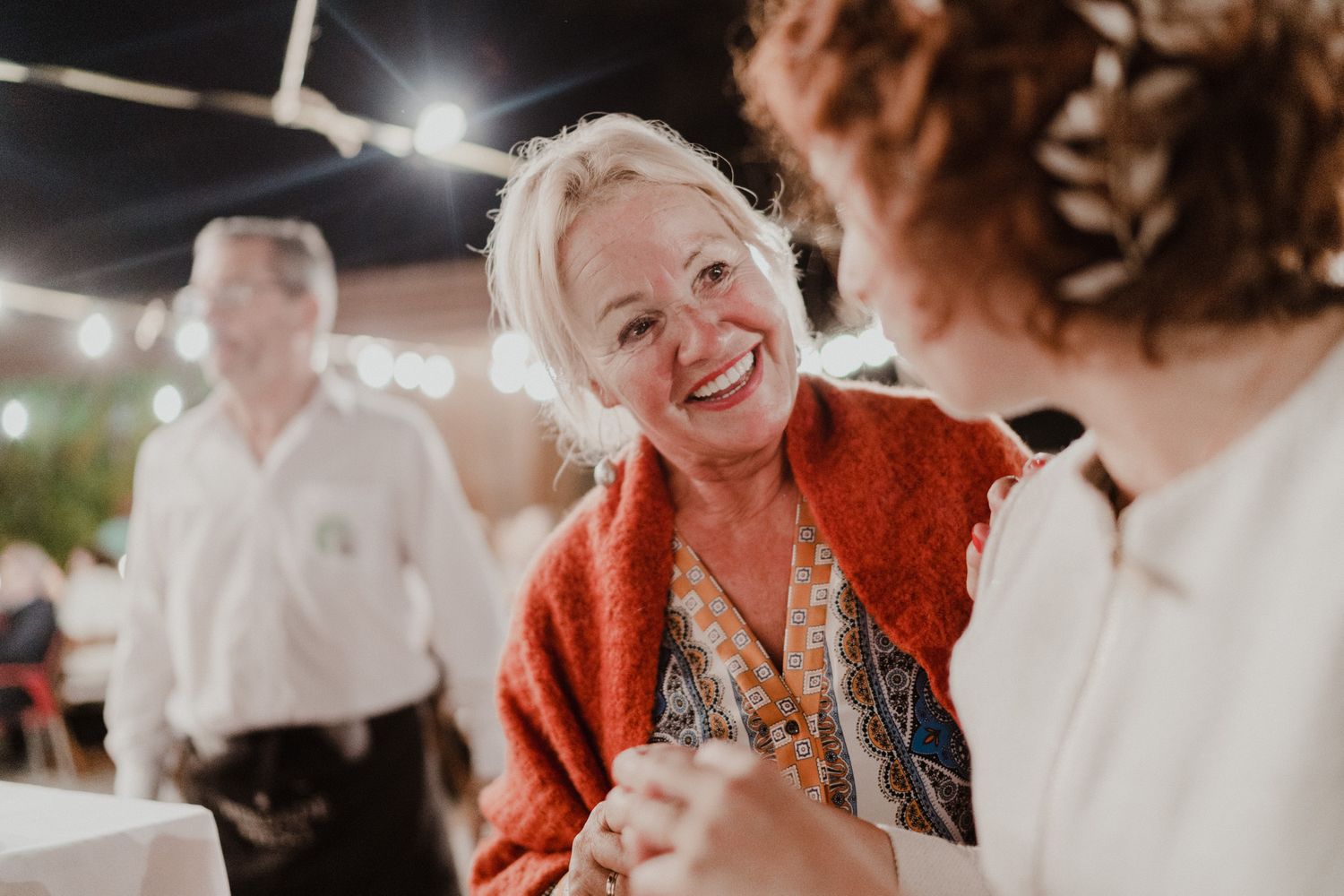 Wedding guests sharing laughter during an intimate Porto wedding