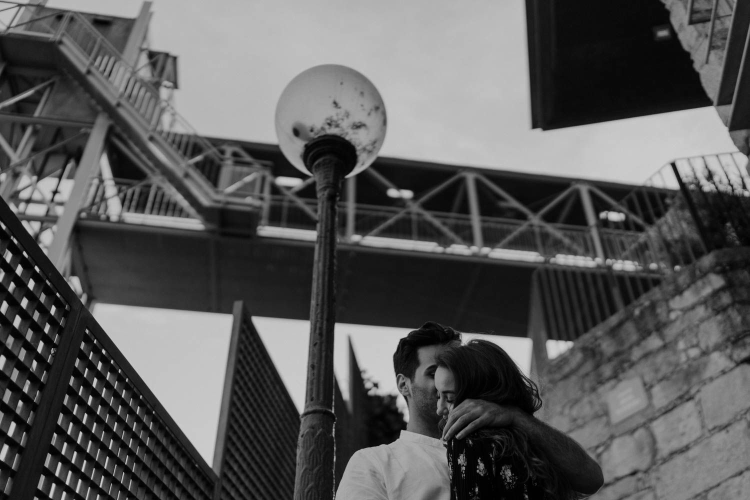 Engagement session in Porto with dramatic skies and authentic connection