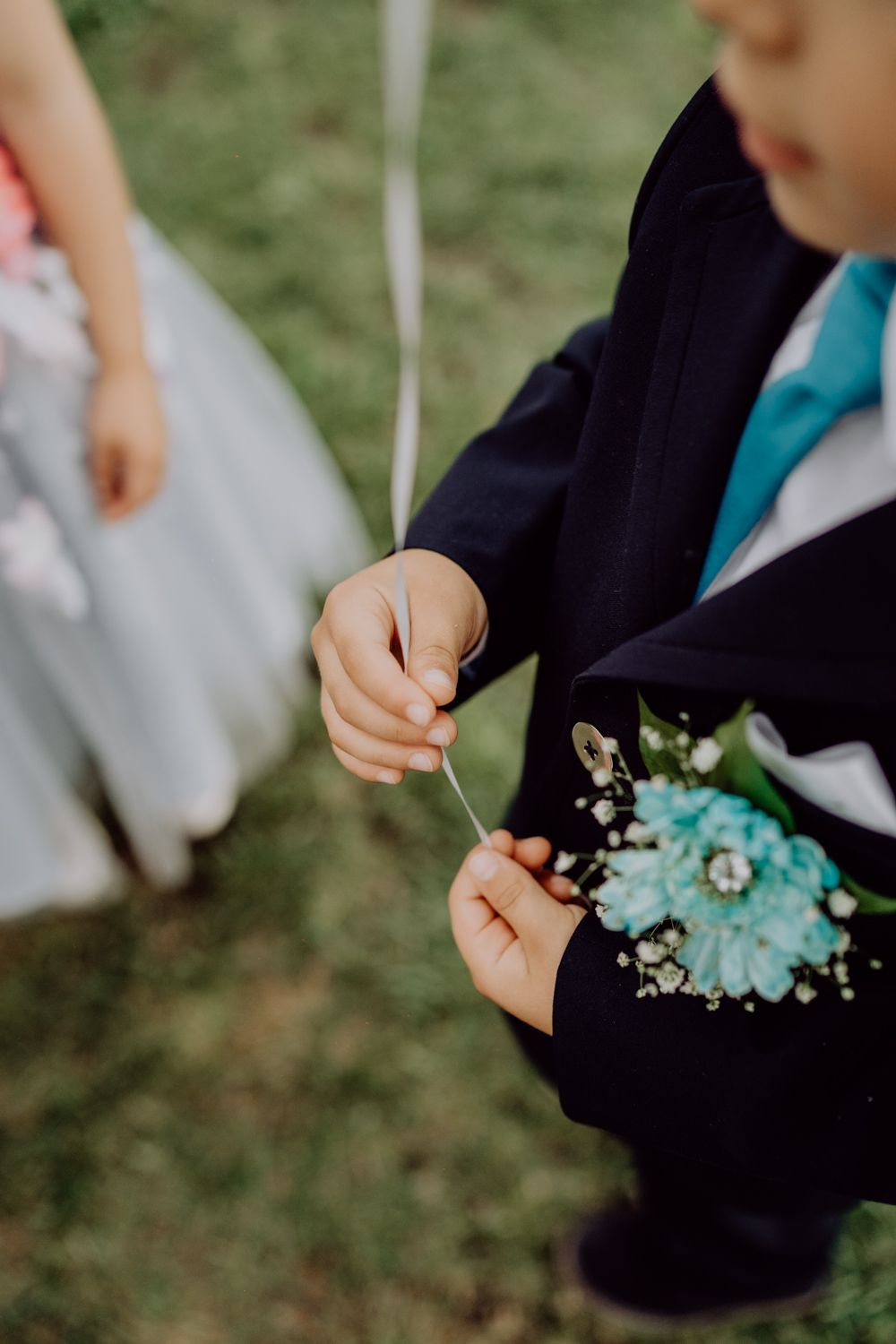 Algarve wedding photographer capturing an emotional cake cutting scene at beachside venue