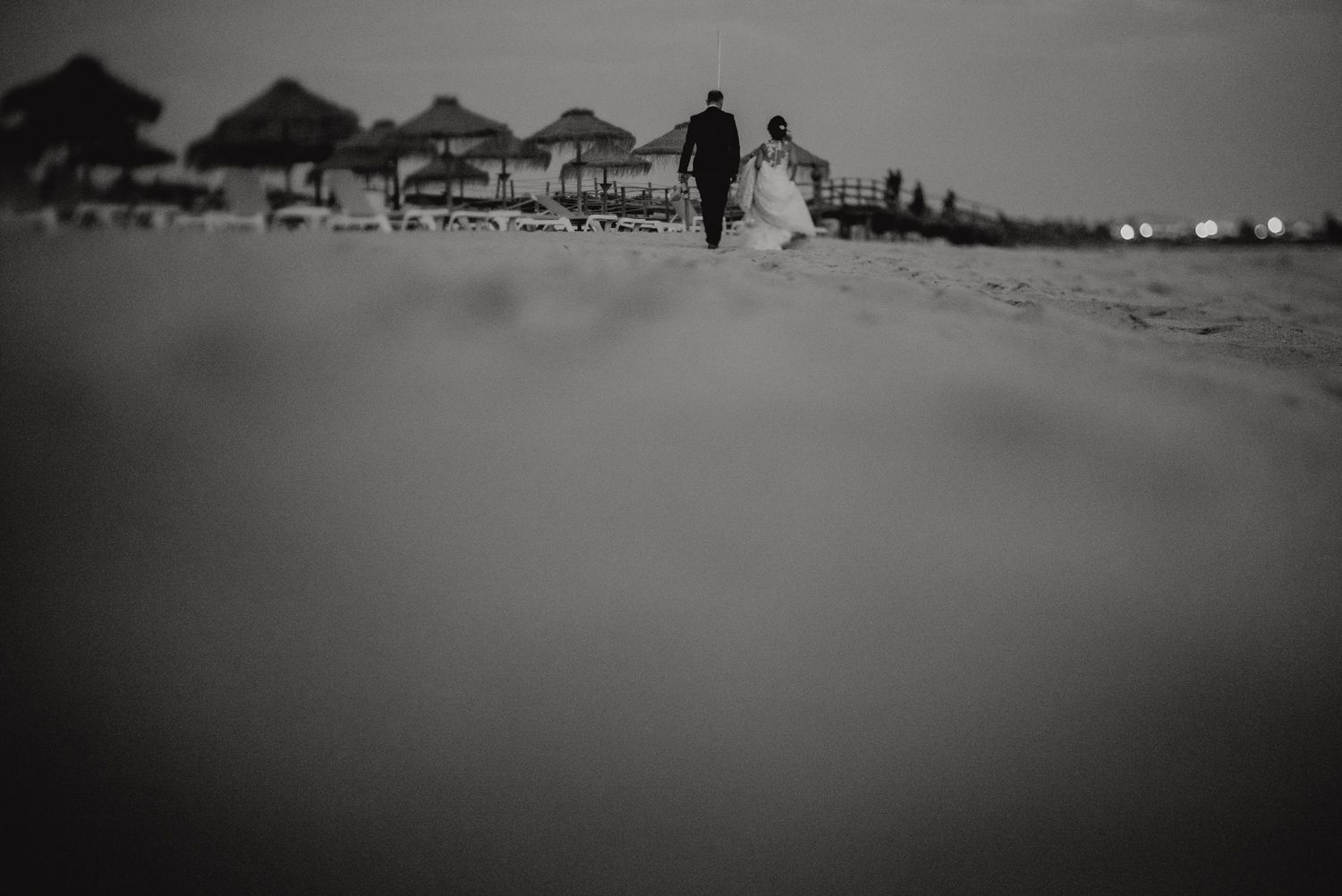 Emotional couple portraits by Algarve wedding photographer during golden hou