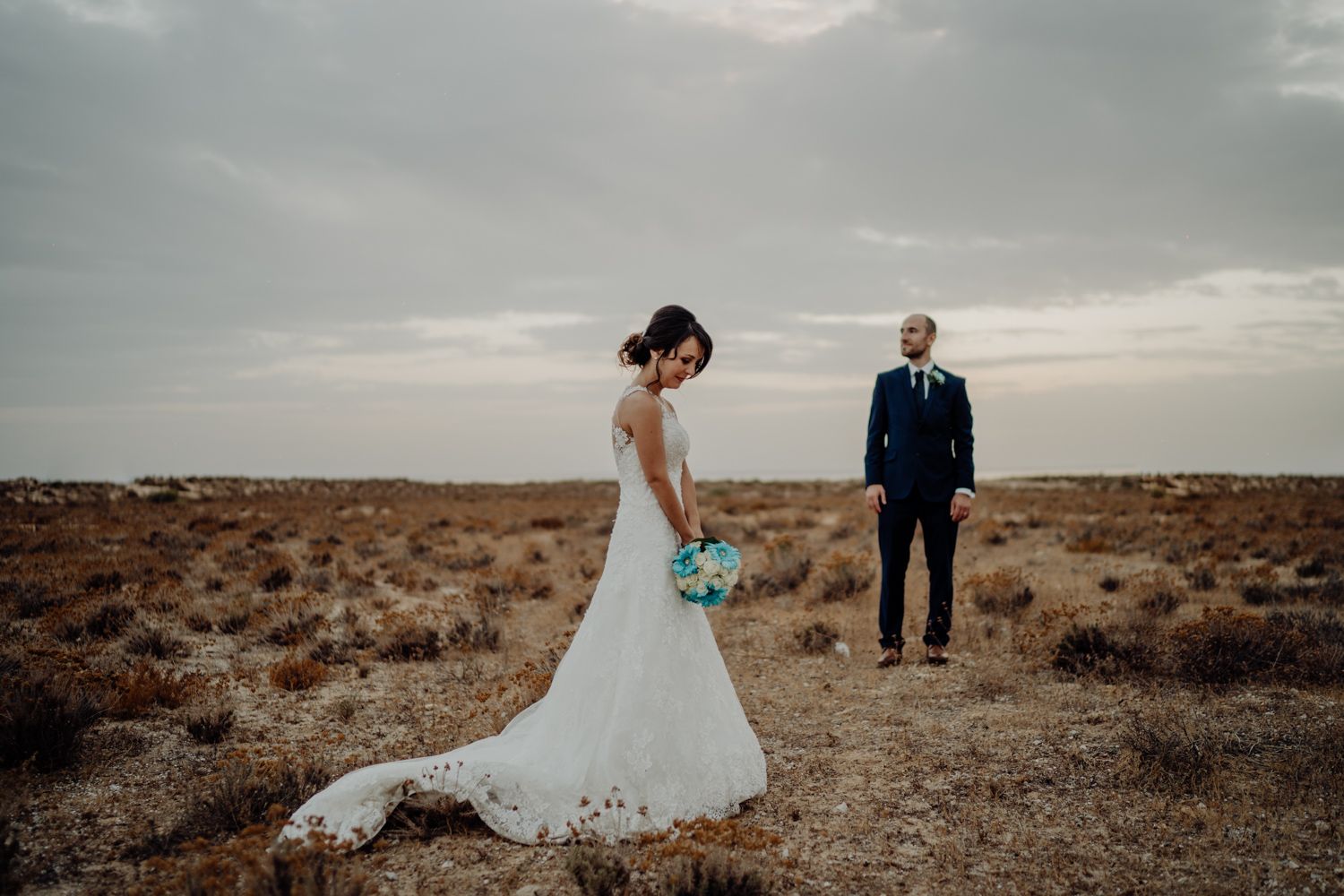 Emotional couple portraits by Algarve wedding photographer during golden hou