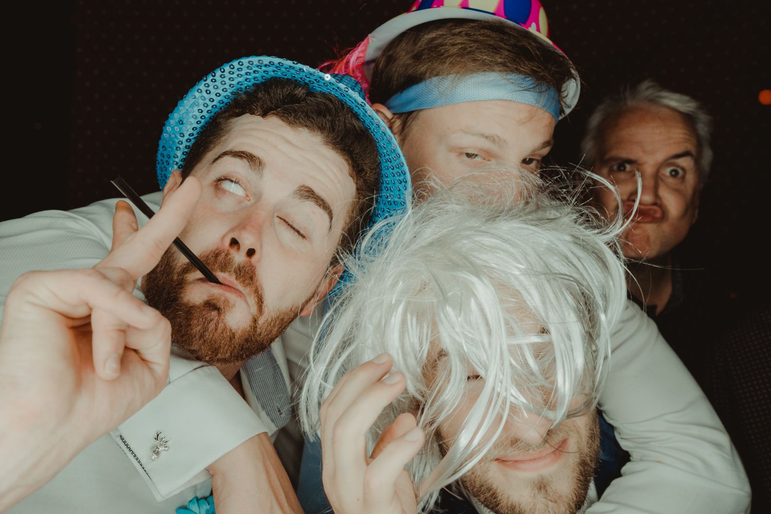 Candid photo booth moment captured by Portugal wedding photographer
