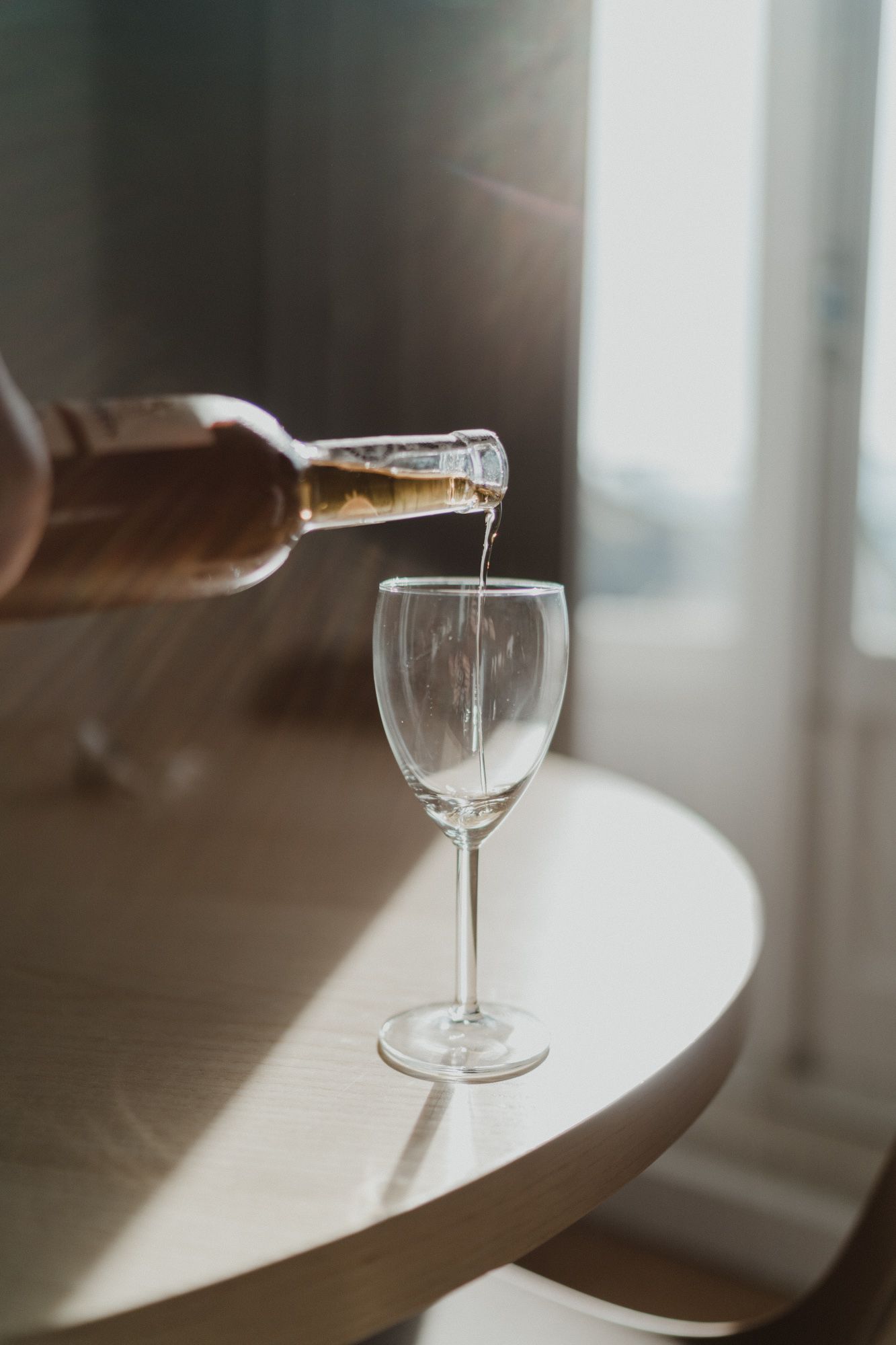 Champagne glass during relaxed wedding preparations in Porto