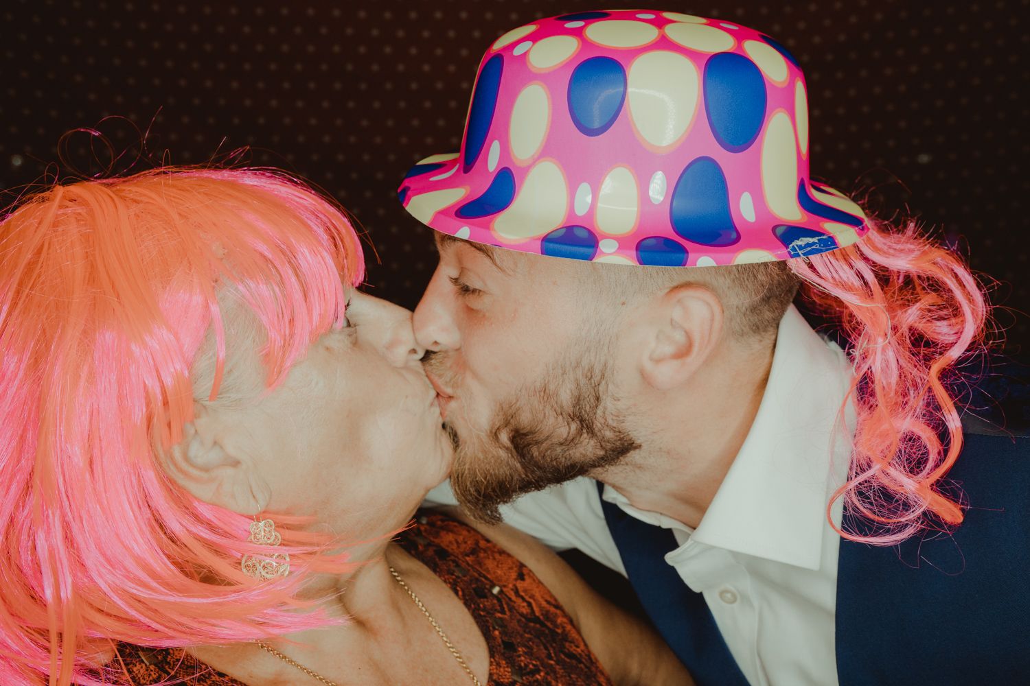Candid photo booth moment captured by Portugal wedding photographer