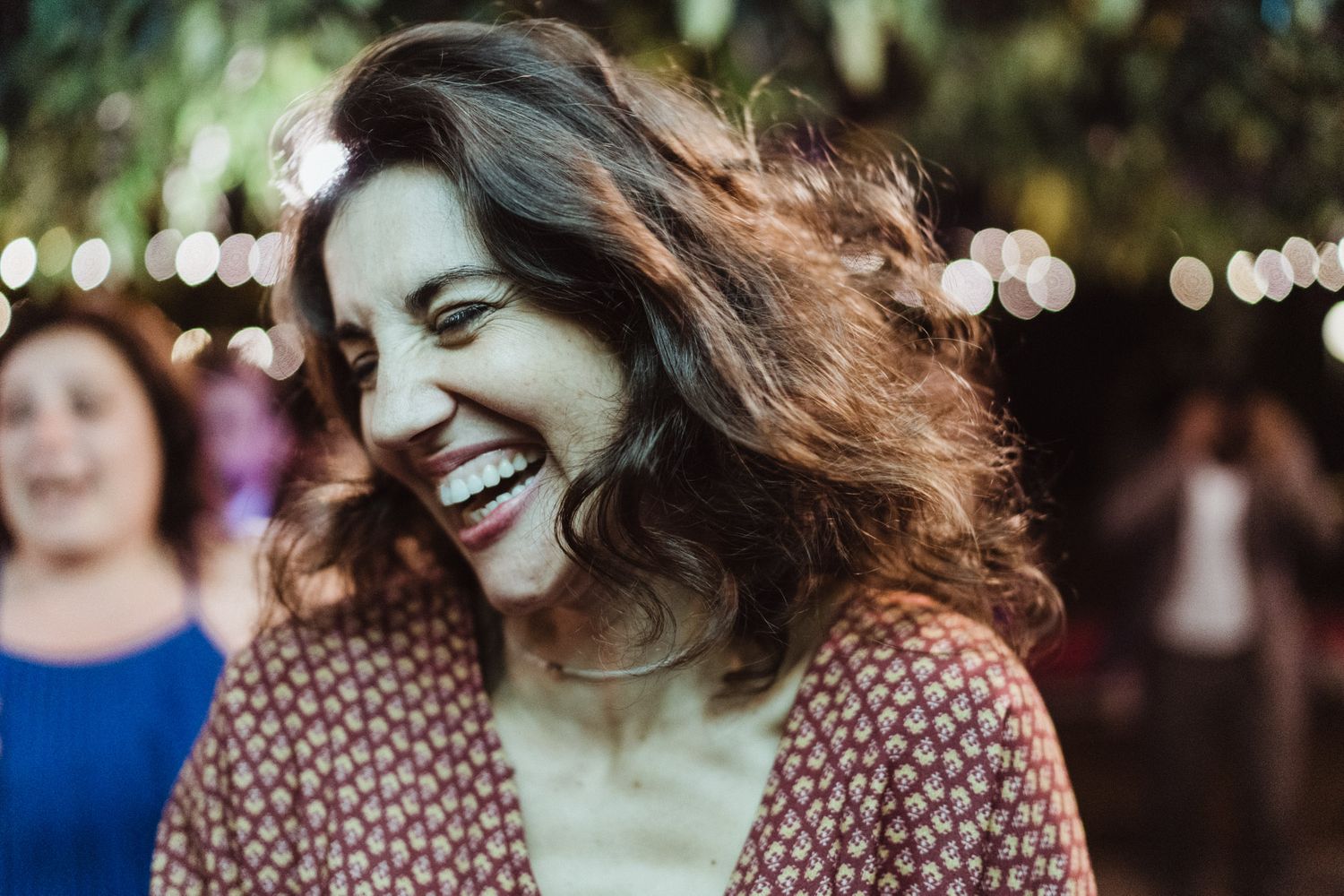 Wedding guest smiling during a joyful intimate wedding in Porto