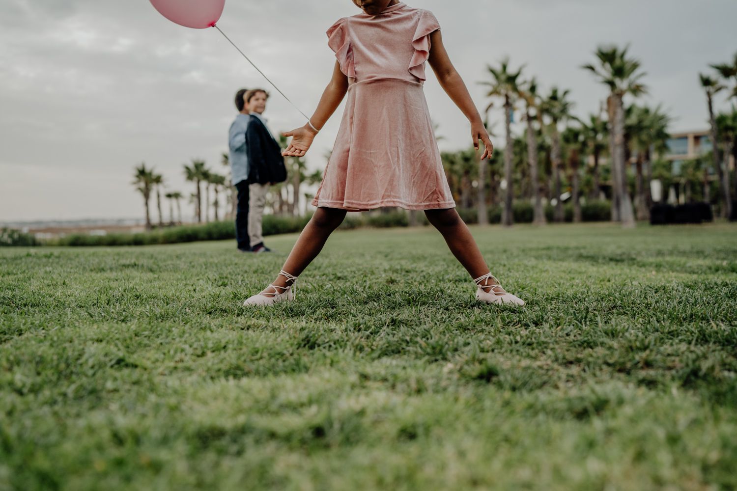 Algarve wedding photographer capturing an emotional cake cutting scene at beachside venue