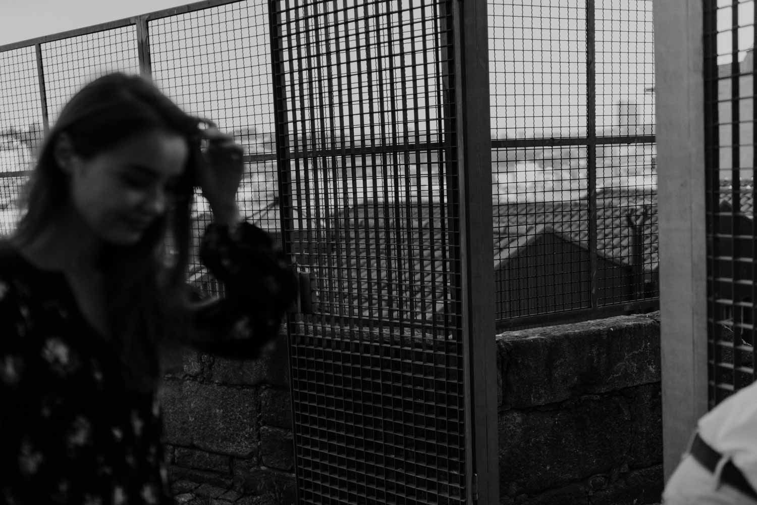 Engagement session in Porto with dramatic skies and authentic connection
