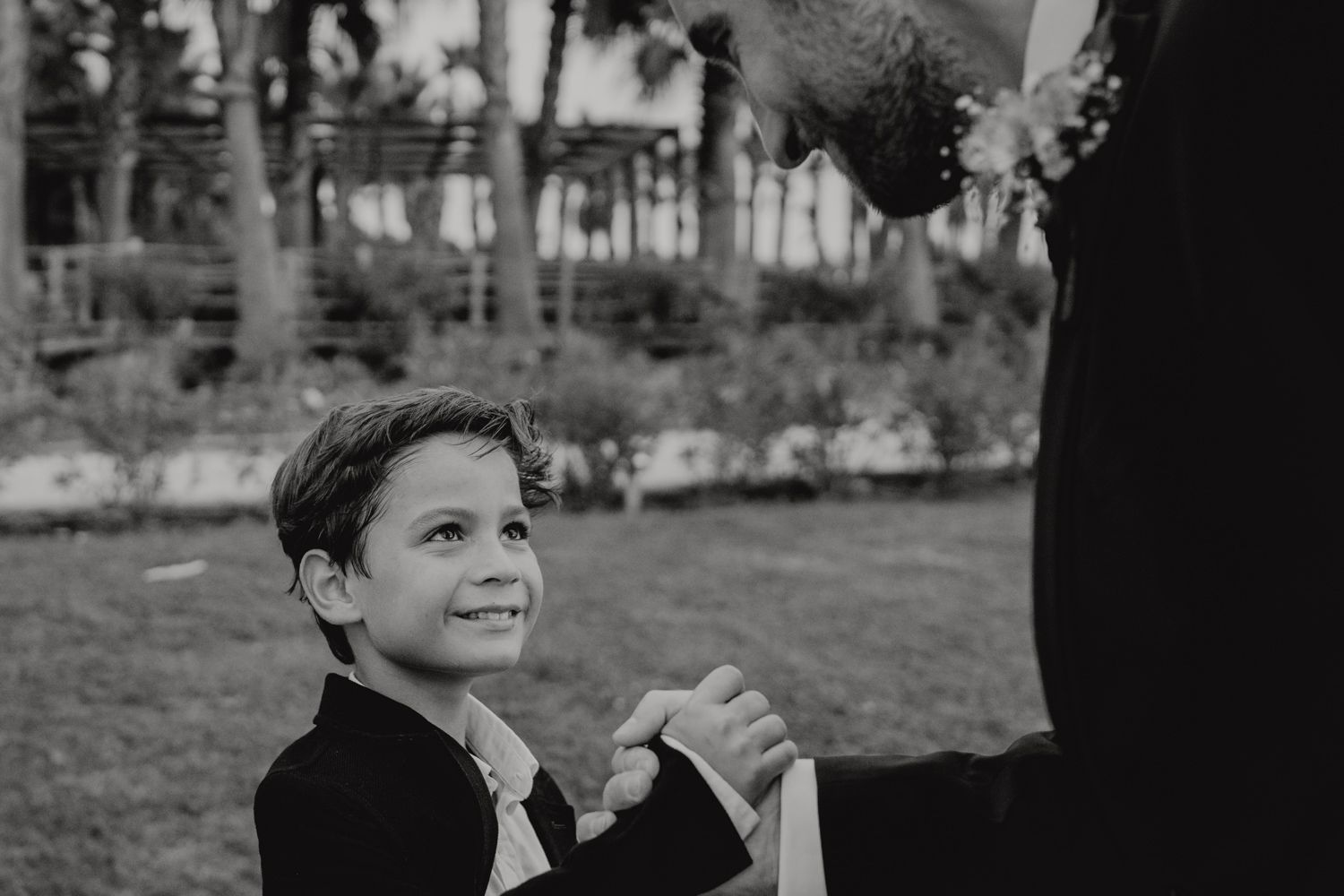 Algarve wedding photographer capturing an emotional cake cutting scene at beachside venue