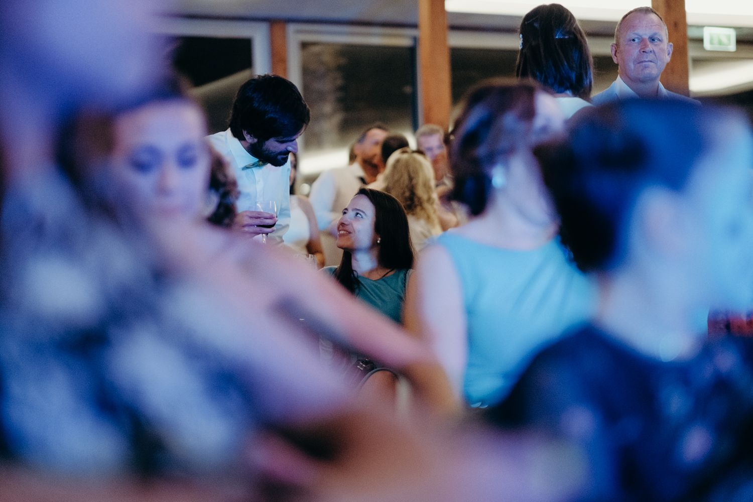 Algarve wedding photographer capturing candid moments at sunset reception in Portugal