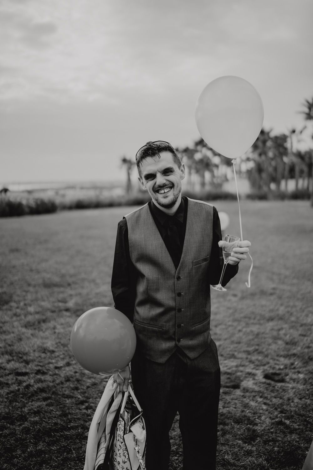 Algarve wedding photographer capturing an emotional cake cutting scene at beachside venue